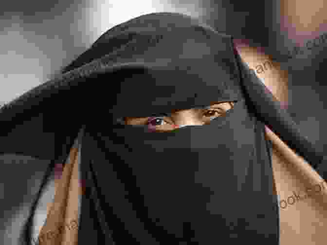 A Portrait Of A Muslim Woman Wearing A Niqab, Holding A Sign That Says Veils Kaye Lynne Booth
